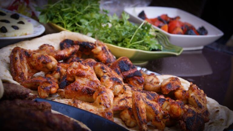 Kip kebab met tzatziki, bulgur en gegrilde paprika